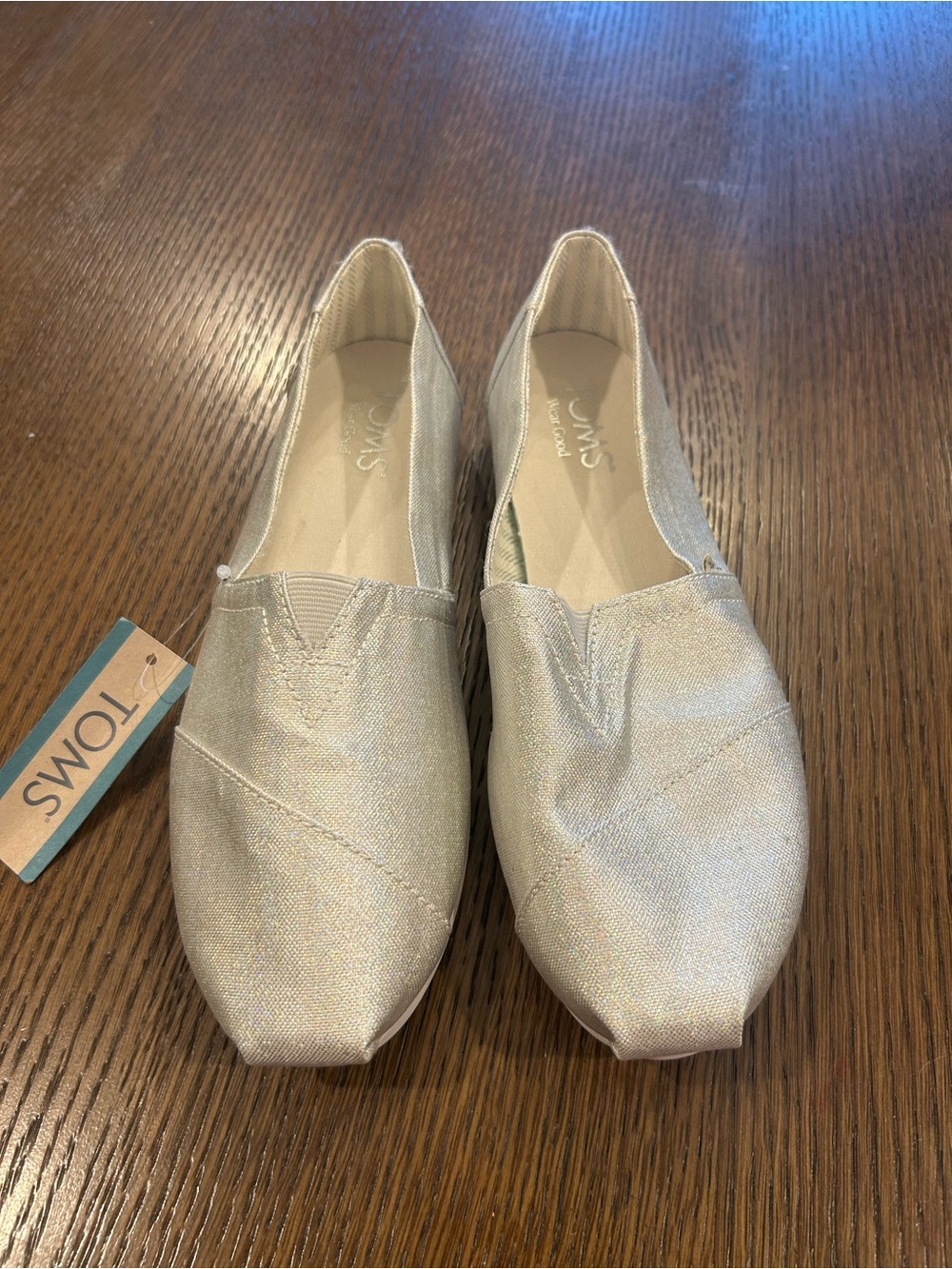 TOMS Silver Shimmer Classic Slip-On Flats. NWT!